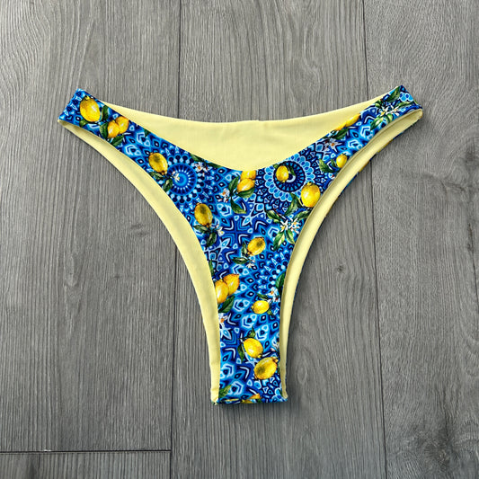 Positano Mid Rise Thong Bikini Bottoms