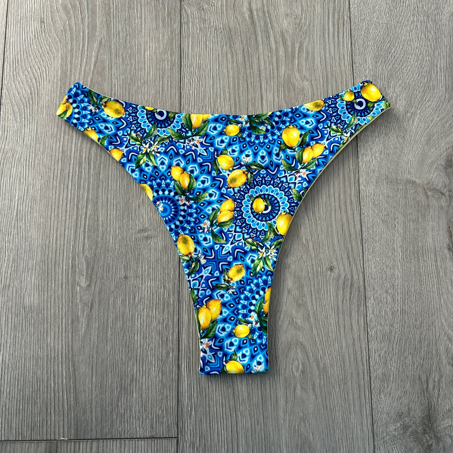 Positano Mid Rise Thong Bikini Bottoms