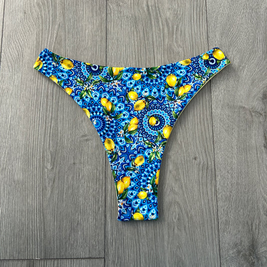 Positano Mid Rise Thong Bikini Bottoms